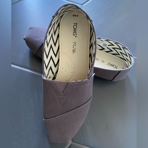 Woman’s grey size 9.5 shoes - Toms
